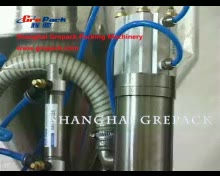 Tube filling and sealing machine
