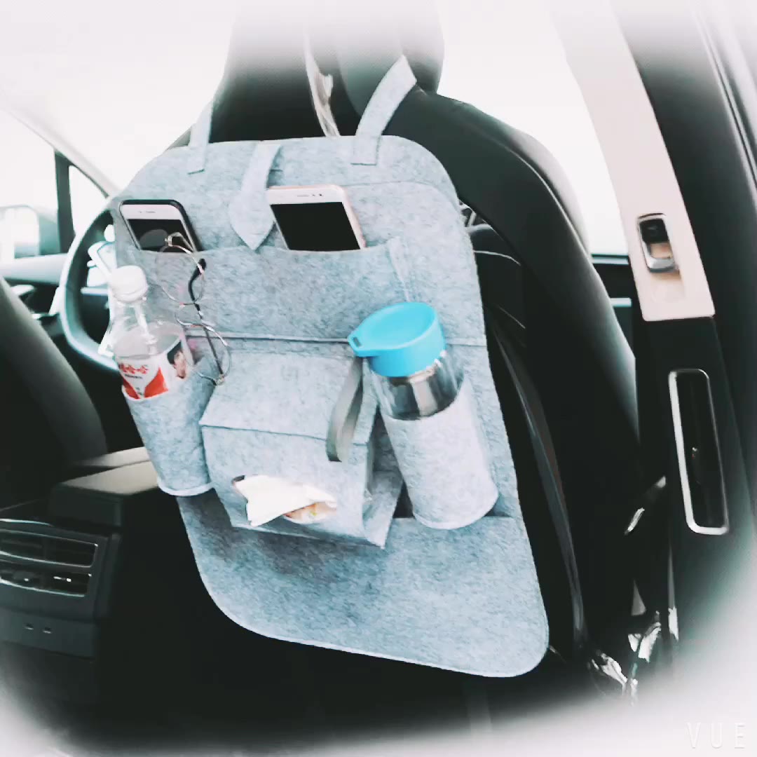 Automobile seat containing hanging bag