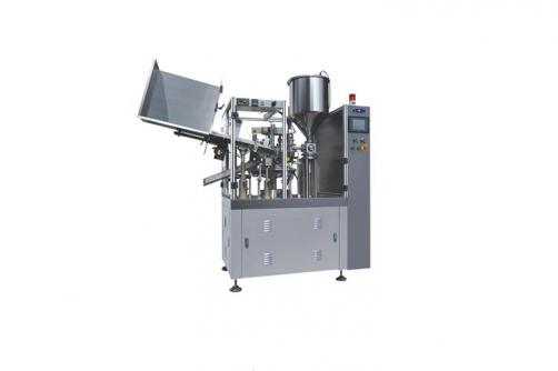 Tube filling and sealing machine