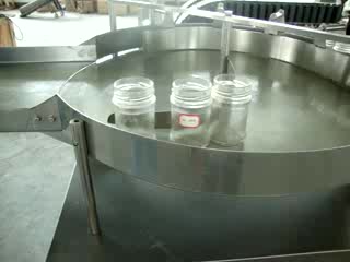 Roller bottle washing machine