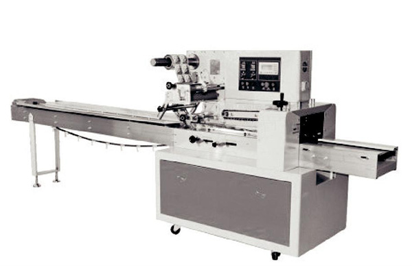Automatic horizontal flow packing system